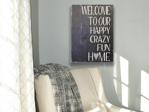 welcome to our happy crazy home wooden sign