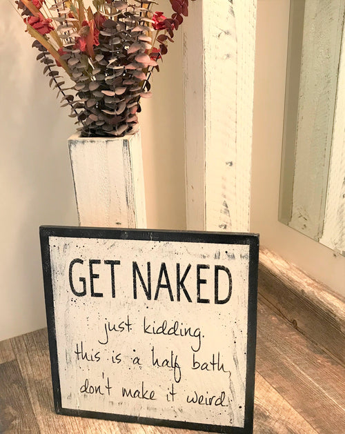 get naked bathroom sign