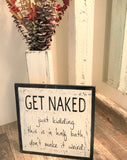 get naked bathroom sign